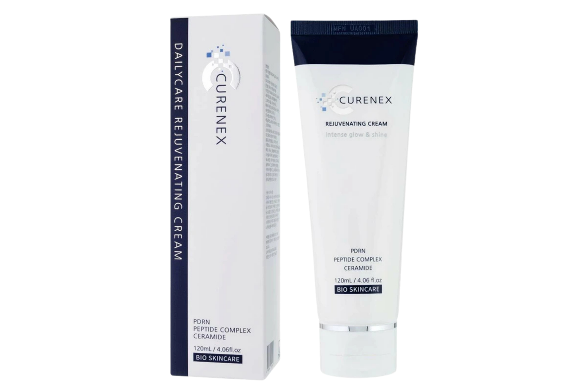 Curenex Daily Care Relieving Cream shown with its white and navy blue outer box and matching squeeze tube on a plain white background.