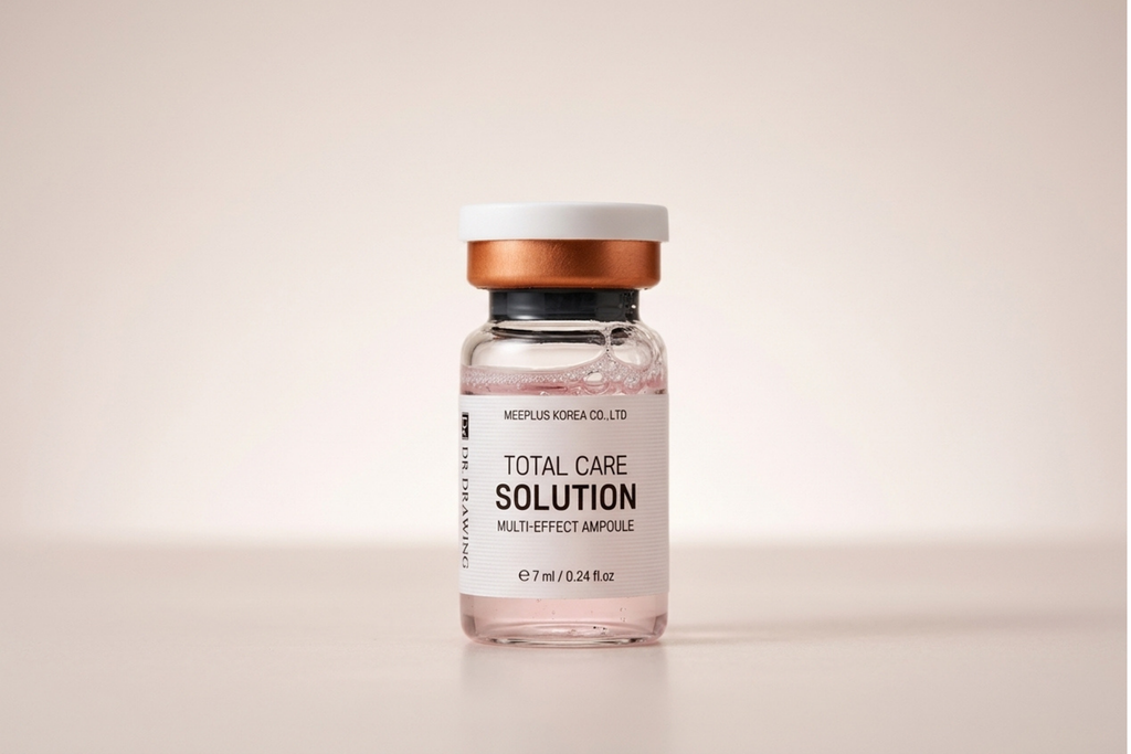 A small glass vial of MesoPlus Korea Co. Ltd.