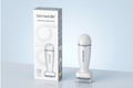 A white and gray bioneedle 120-minute adjustable needle size device shown next to its retail packaging box on a light blue-gray background.