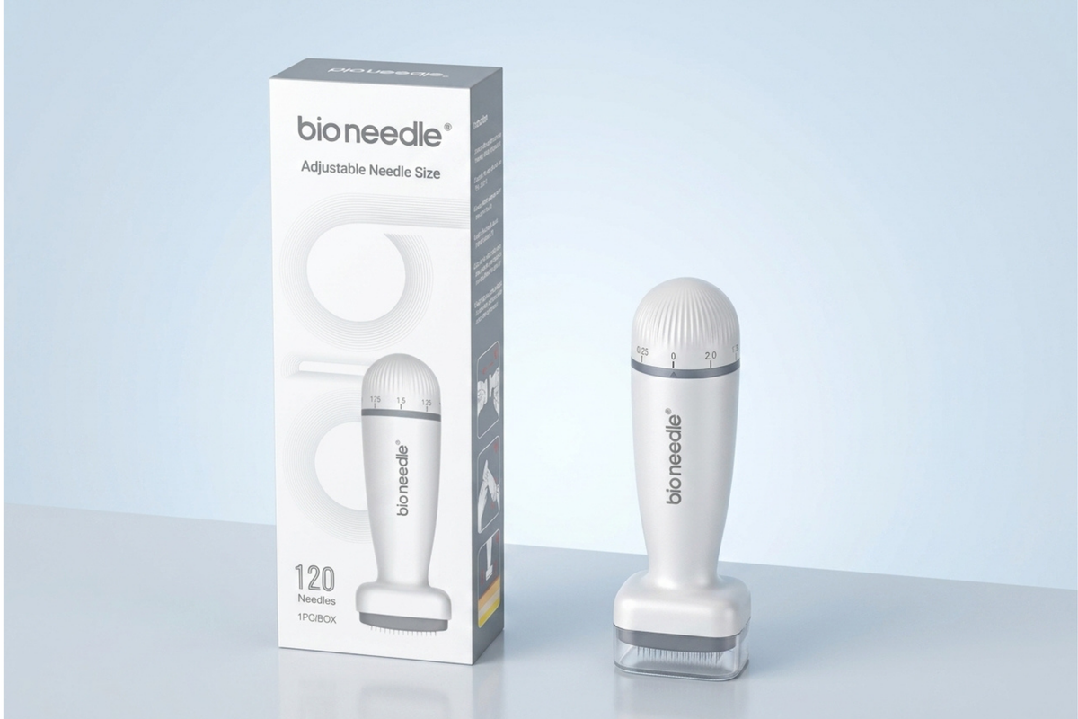 A white and gray bioneedle 120-minute adjustable needle size device shown next to its retail packaging box on a light blue-gray background.